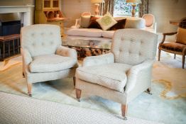 A pair of upholstered armchairs by George Smith, in Victorian style, of recent manufacture, after