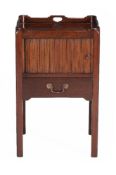 A George III mahogany night commode, circa 1780, with tambour front above a single drawer, 79cm