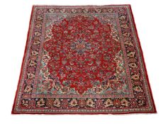 A Persian rug, approximately 373 x 268cm