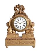 A Continental carved giltwood mantel clock, early 19th century, probably French or Austrian, the