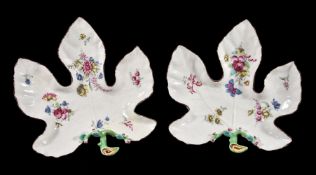 A pair of Bow porcelain leaf-shaped dishes, circa 1765, painted with flowers within brown-line rims,