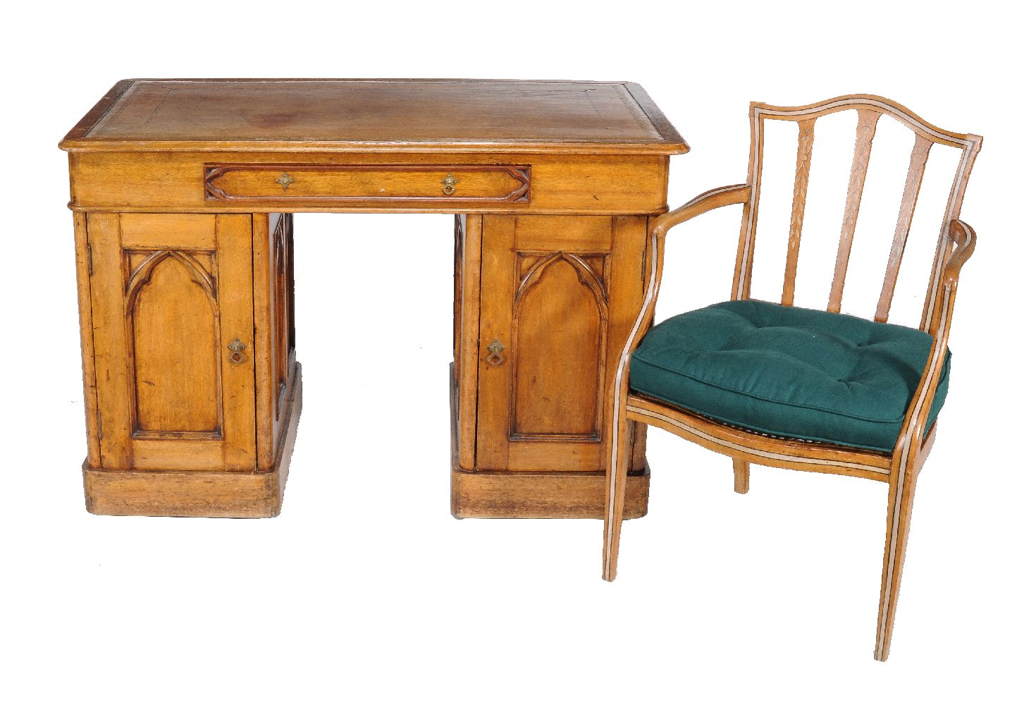 An oak twin pedestal desk in Gothic Revival style, circa 1860 and later, 70cm high, 121cm wide, 69cm