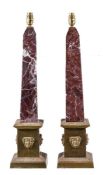 A pair of substantial variegated red and white marble and gilt bronze mounted obelisks fitted as