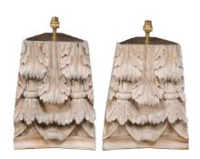 A pair of wooden table lamps, of recent manufacture, each carved as an inverted section of a