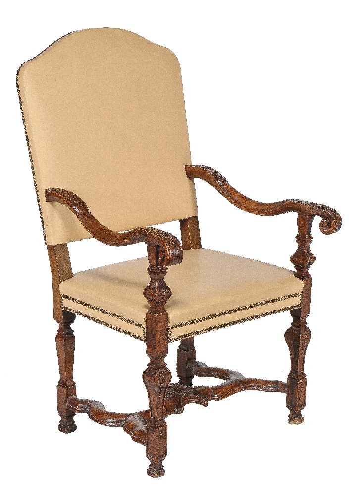 A Continental walnut and leather upholstered armchair, early 18th century and later,