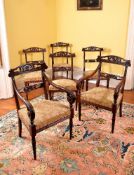 A set of six mahogany dining chairs, circa 1840, probably Colonial, to include two armchairs, each