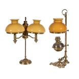 Two similar Students' oil table lamps in the manner of Edward Miller & Co, possibly American,