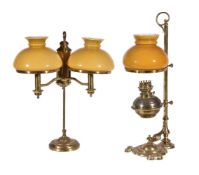 Two similar Students' oil table lamps in the manner of Edward Miller & Co, possibly American,