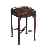 A mahogany occasional table, in George III style, 19th century, the serpentine sided spindle