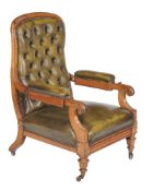 A Victorian green leather upholstered library armchair, circa 1870, with reclining action after