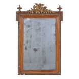 A simulated pitch pine, gilt metal mounted and gilt composition wall mirror in George III style,