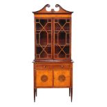 A mahogany and satinwood bookcase cabinet, late 18th century and later, 205cm high, 88cm wide,