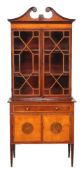A mahogany and satinwood bookcase cabinet, late 18th century and later, 205cm high, 88cm wide,