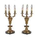 A pair of gilt brass and marble mounted three light table lamps in Louis XIV style, 20th century,