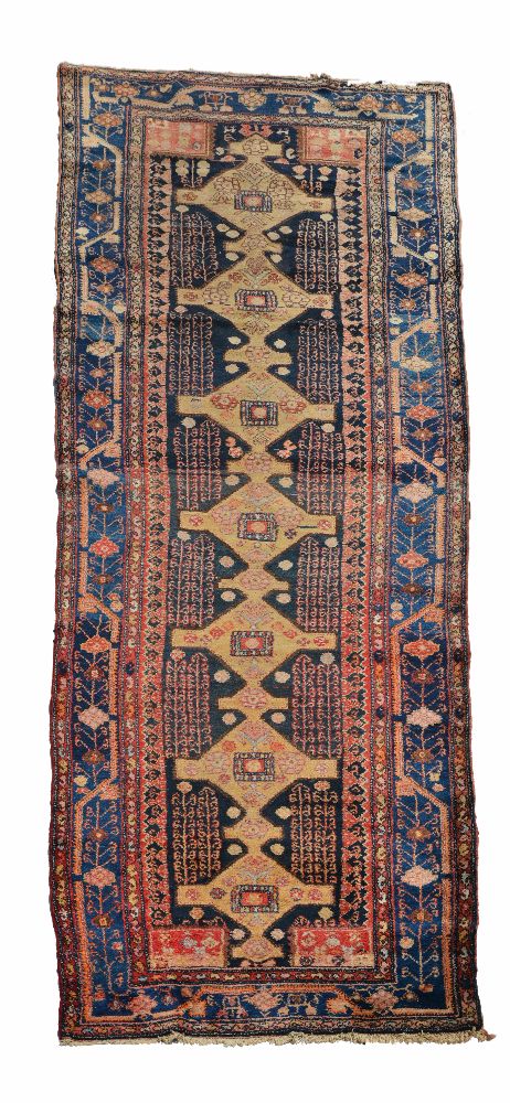 A Hamadan carpet, approximately 455cm x 137cm