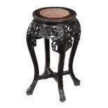 A Chinese hardwood and marble topped stand, 62cm high, the top 31cm diameter