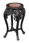 A Chinese hardwood and marble topped stand, 62cm high, the top 31cm diameter