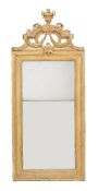 A giltwood and composition wall mirror, late 19th century, with bevelled split plate, 180cm high,