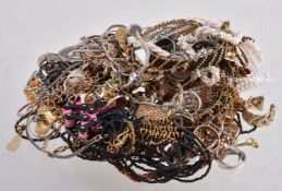 A collection of costume jewellery, to include bangles; rings; necklaces