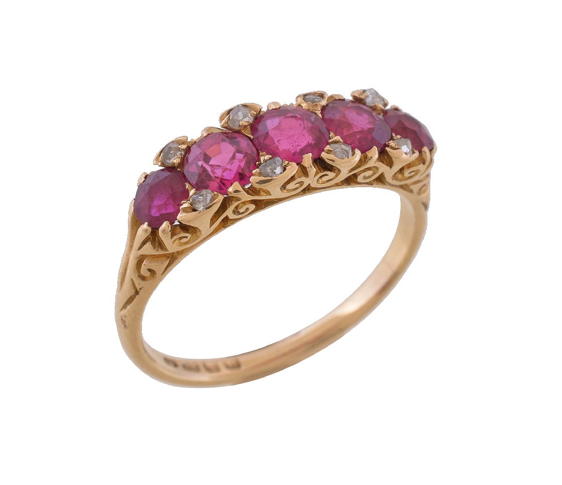 An Edwardian synthetic red stone and diamond point ring, the graduated circular cut red stones