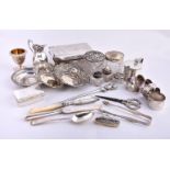ϒ A collection of silver and silver mounted items, including: a plain drum mustard pot by Crichton