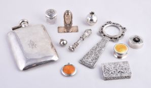 A collection of silver and silver coloured items, including: a Canadian rounded rectangular 8 oz