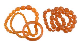 A treated single row amber bead necklace, the graduated oval treated amber beads, measuring 21mm