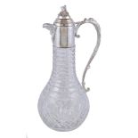 A silver mounted cut glass claret jug by A. J. Poole, Birmingham 1998, with a grape vine finial to