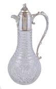 A silver mounted cut glass claret jug by A. J. Poole, Birmingham 1998, with a grape vine finial to