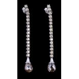 A pair of diamond earrings, the briolette cut brown diamond drops suspending below a row of