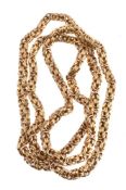 A gold fancy link coloured chain, composed of textured interwoven links, stamped 750, 129g, 72cm