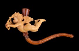 A meerschaum cheroot pipe, carved with a flying Cupid holding his bow and arrow, with an amber