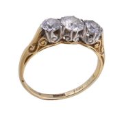 A mid 20th century diamond three stone ring, set with three brilliant cut diamonds, approximately