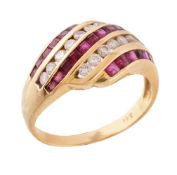A ruby and diamond ring, set with alternating panels of square cut rubies and brilliant cut