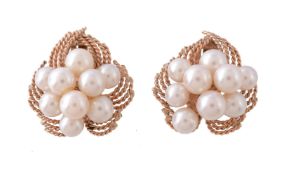 A pair of 1970s cultured pearl ear clips, the cluster of cultured pearls within a ropetwist