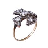 A Victorian diamond Maltese cross ring, the Maltese cross panel set with old cut diamonds,