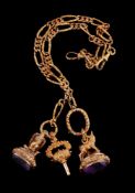 A late 19th century Portuguese watch chain, circa 1890, the chased foliate links suspending an eagle