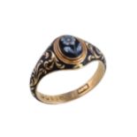 A William IV 18 carat gold sardonyx and enamel ring, the oval sardonyx panel carved with a forget-