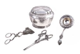 A Czechoslovakian silver shaped oval tea caddy, 1922-29 3rd standard (.800); a German vine pattern