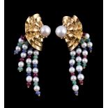 A pair of cultured pearl and gem set earrings, the principal cultured pearl within an undulating