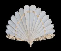 ϒ A European ivory brisé fan, mid 19th century, the short guards relief carved with flowers