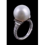 A South Sea cultured pearl and diamond ring, the South Sea cultured pearl, measuring approximately