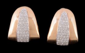 A pair of diamond earrings, the triangular shaped earrings, set with a panel of brilliant cut