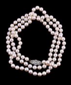 An opera length cultured pearl necklace with diamond clasp, the one hundred and fourteen cultured