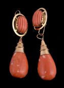 ϒ A pair of coral drop earrings, the coral drop polished to one side, the other side carved,