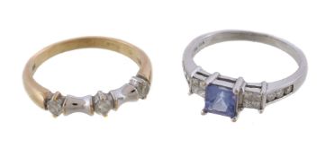 A diamond and tanzanite dress ring, the central square cut tanzanite between princess cut diamond