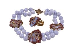 A blue lace agate and garnet necklace and ring, the necklace with polished blue lace agate beads
