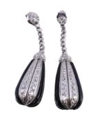 A pair of onyx and diamond drop earrings, the carved onyx panels with panels of old brilliant