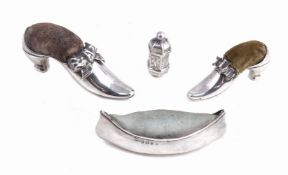 Three silver novelty pin cushions, comprising: a shoe pin cushion by Adie & Lovekin Ltd,