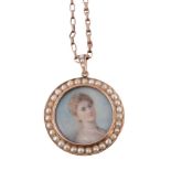 An early 20th century half pearl and painted miniature pendant, circa 1900, the circular panel